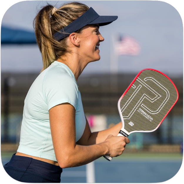 Titan Nova 14L Pickleball Paddle Held by Lady.
