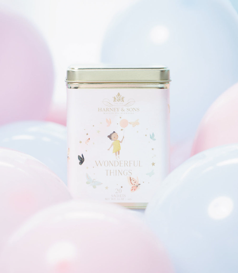 Wonderful Things Girl, Tin of 20 Tea Sachets with background.