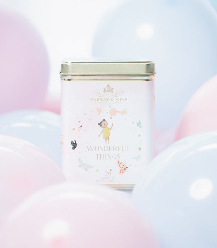 Wonderful Things Girl, Tin of 20 Tea Sachets with background.