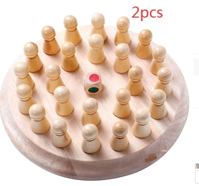 Wooden game pieces on a round wooden board with two additional pieces above.