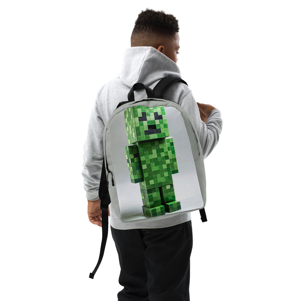 Person wearing a backpack with a pixelated green character design on a white background.