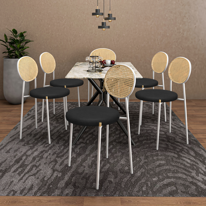 LeisureMod Euston Modern Wicker Dining Chair with White Frame and Leather Seat in Charcoal Set of 2 at Table.