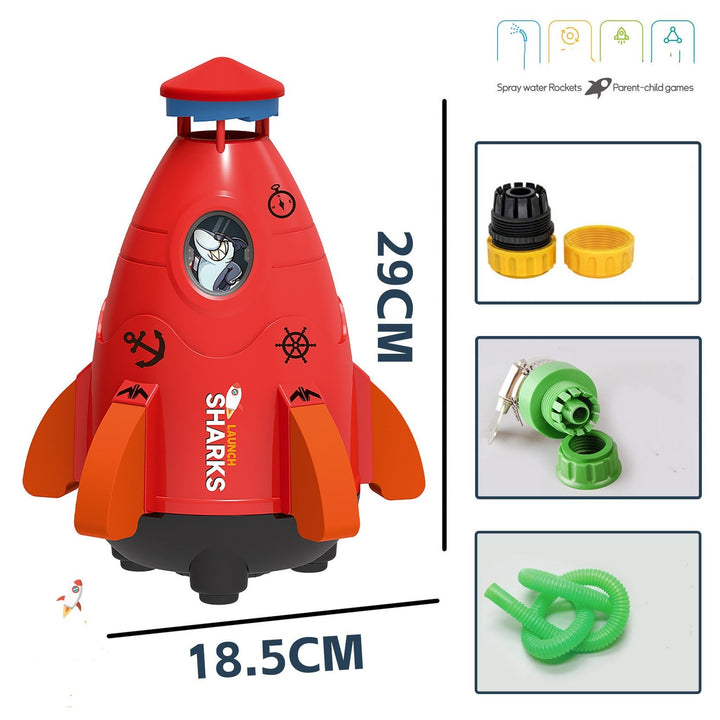 Red toy rocket with measurement details and additional components on a white background.