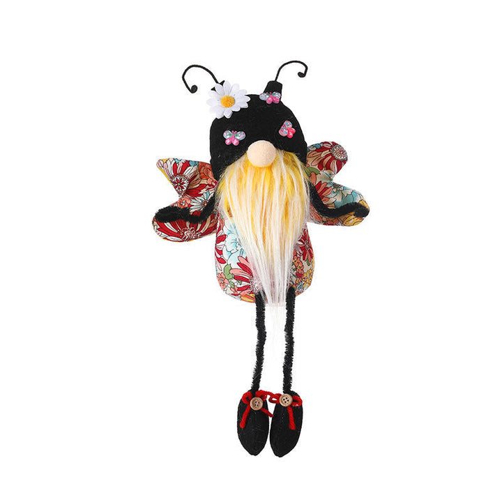 Decorative gnome with floral wings and a long beard on a white background.