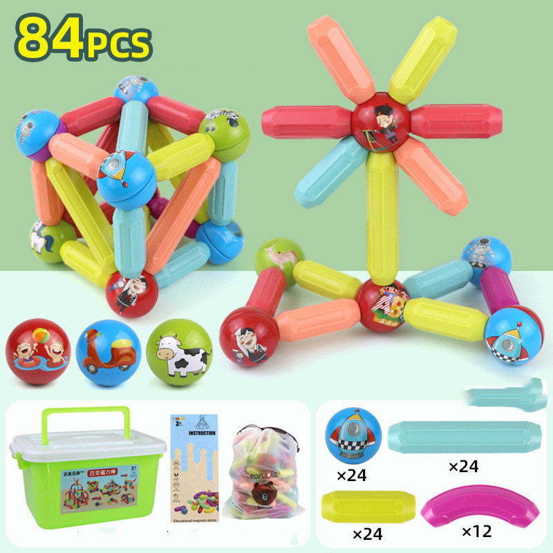 Colorful building block toys with cartoon characters on a green background.