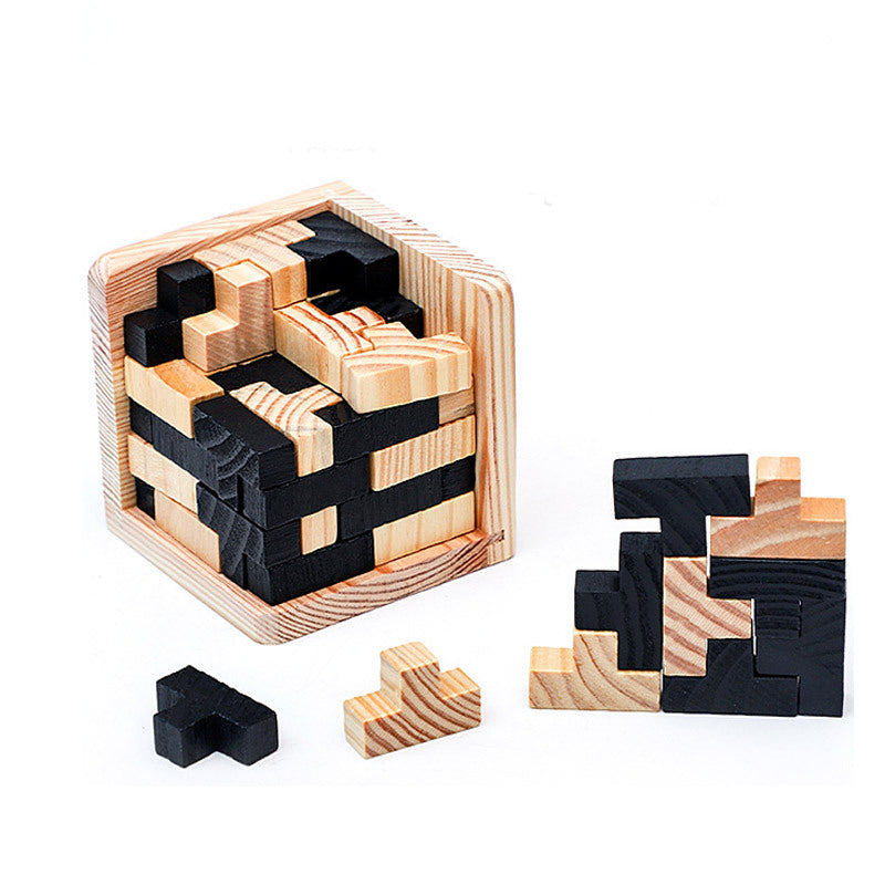 Wooden puzzle with black and natural wood pieces on a white background.