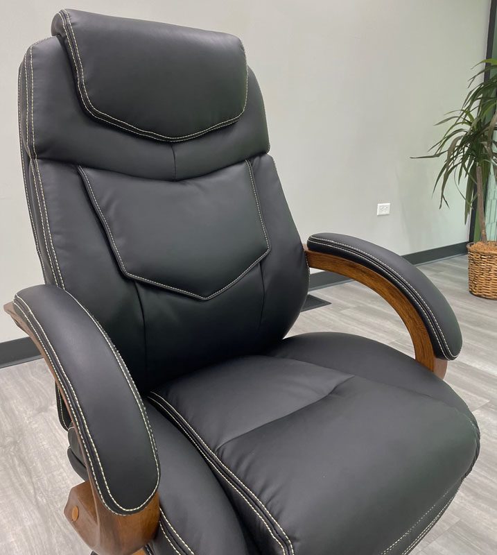 Black Leather Office Chair with Wood Arms and Base Closeup