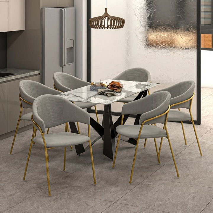 LeisureMod Bella Collection Modern Dining Chair in Light Grey at Table.