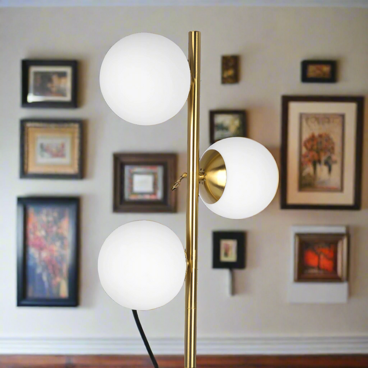 Brilliance Modern Gold Brush Floor Lamp, Opal Glass Shades and Round Metal Base Closeup.