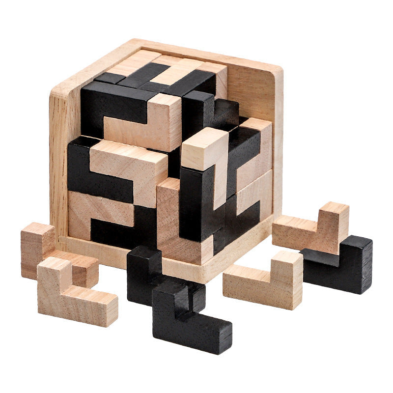 Wooden puzzle with black and natural wood blocks on a white background.