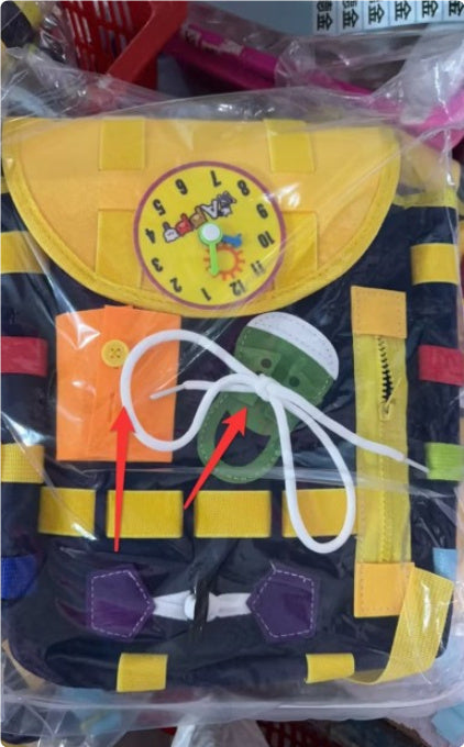 Colorful toy with a clock design and various shapes on a clear plastic bag.