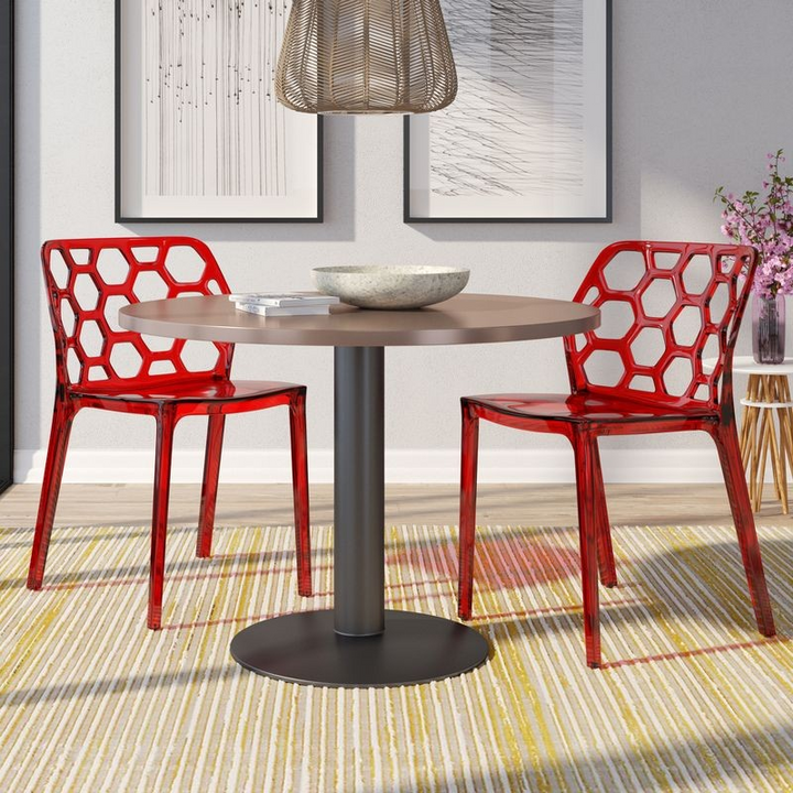 LeisureMod Modern Dynamic Dining Chair, Set of 2 Transparent Red at Table.