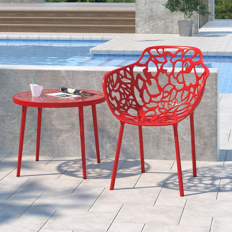 LeisureMod Modern Devon Aluminum Armchair Red at Table.