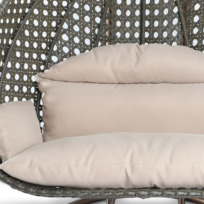 LeisureMod Beige Wicker Hanging 2 person Egg Swing Chair Beige Cushion Closeup.