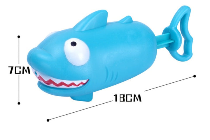 Blue shark-shaped toy with measurements on a white background.