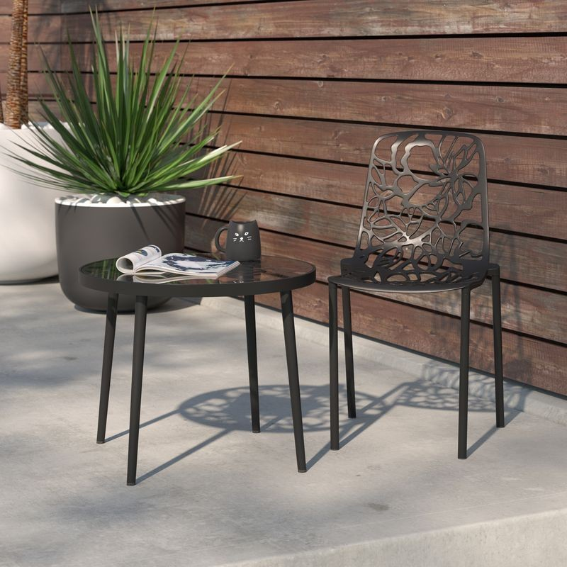 LeisureMod Modern Devon Aluminum Chair Black at Table.