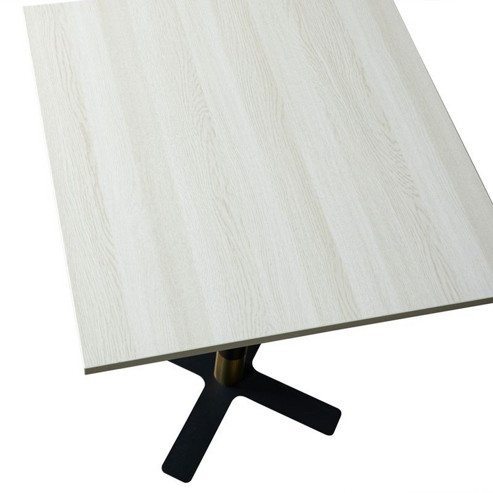 LeisureMod Vail Collection Dining Table Black/Gold X Base With 24" Square Light Wood Brown MDF Top Closeup.