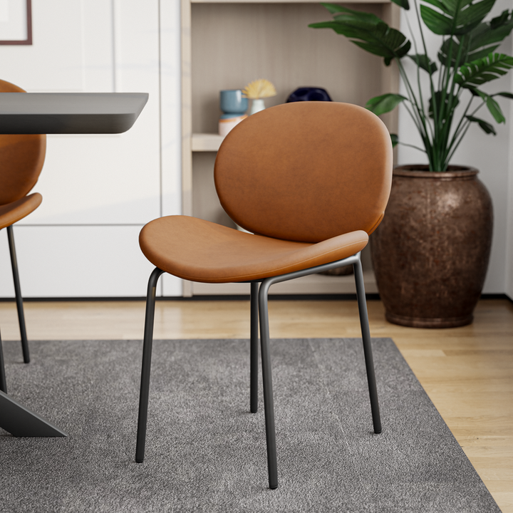 LeisureMod Servos Modern Dining Side Chair with Upholstered Faux Leather Seat and Powder Coated Iron Frame for Kitchen and Dining Room Dark Brown with Background.