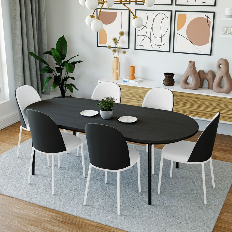 LeisureMod Tule 7-Piece Dining Set in White Steel Frame with 6 Upholstered Seat Dining Chairs and 71" Oval Dining Table with MDF Tabletop in Black/White in Dining Room.