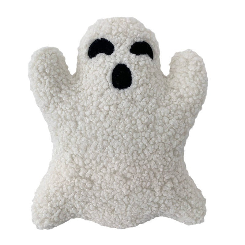 White ghost-shaped plush toy with black eyes and mouth on a white background.