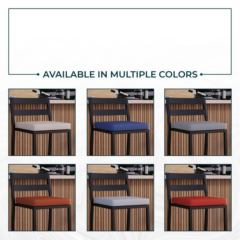 Chair with different colored cushions displayed against a wooden background.
