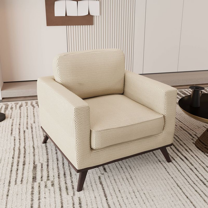 LeisureMod Chester Modern Faux Leather Accent Armchair in Beige Mesh Angled Photo.
