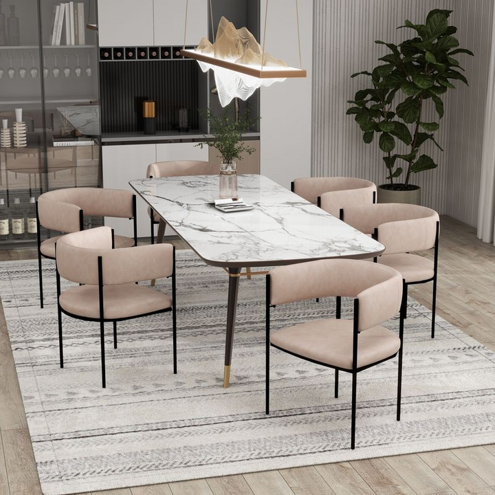 LeisureMod Cyril Collection Modern Chair in Taupe at Table.