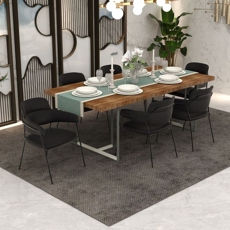 LeisureMod Axis Collection Modern Dining Chair in Black at Table.