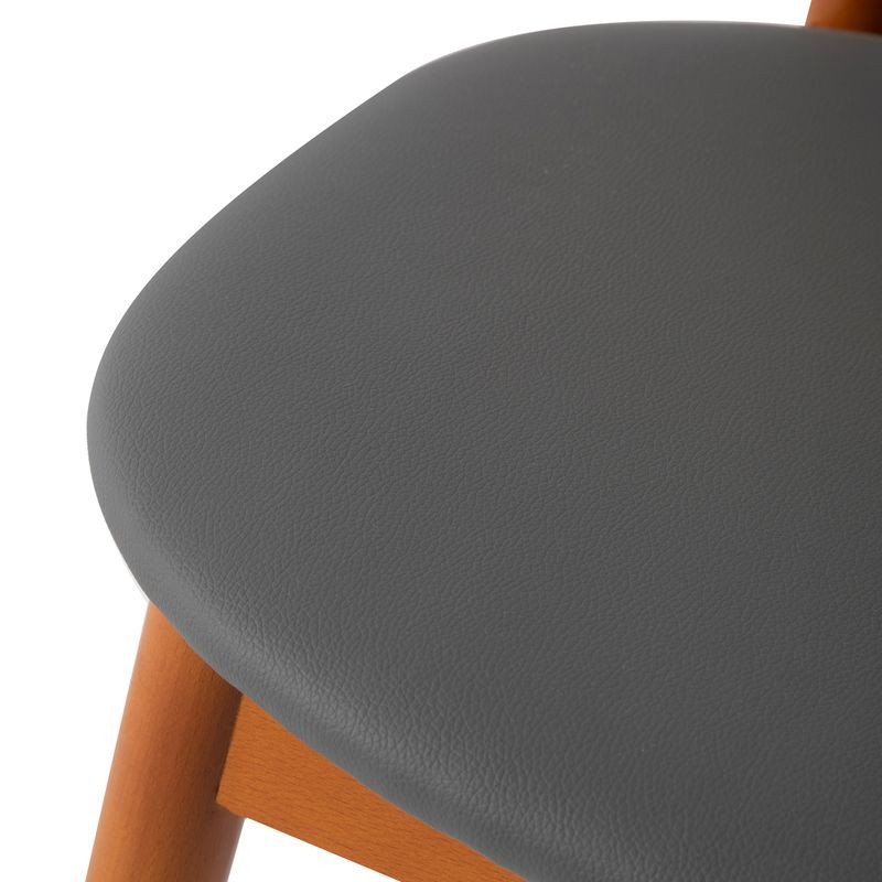 LeisureMod Holbeck Wicker Dining Chair with Upholstered Leather Seat and Beech Wood Legs Grey Closeup.