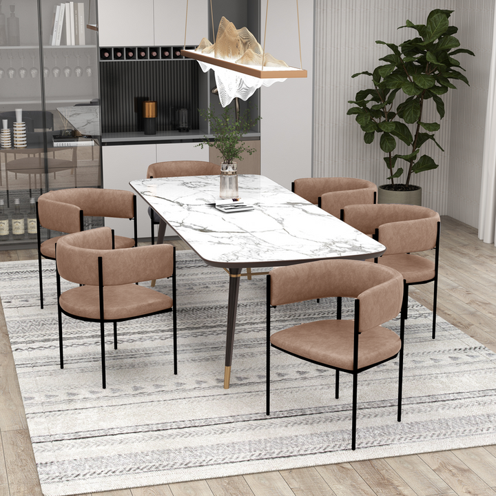 LeisureMod Cyril Collection Modern Chair in Light Brown Velvet at Table.