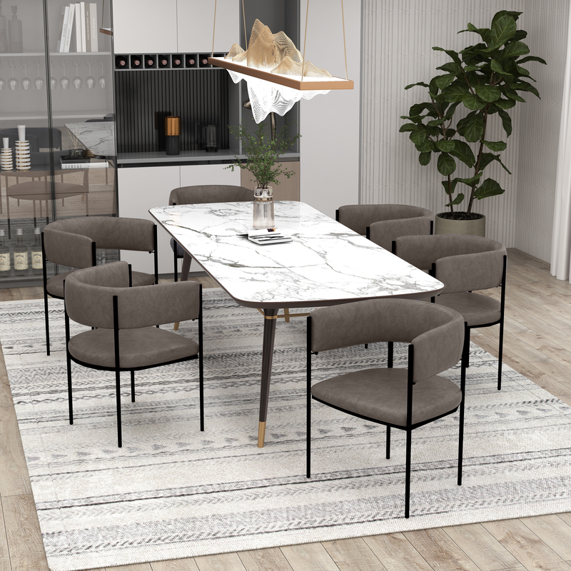 LeisureMod Cyril Collection Modern Chair in Charcoal at Table.