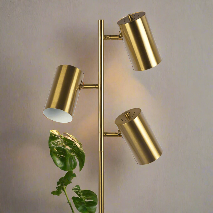 Harmony Brass Gold Floor Lamp with Rotary Switch Triple Spots Metal Block Base Closeup.