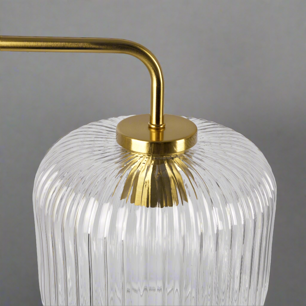 Haven Clear Glass Table Lamp, Gold Brush Metal and Marble Base, Button Control Zoomed In.