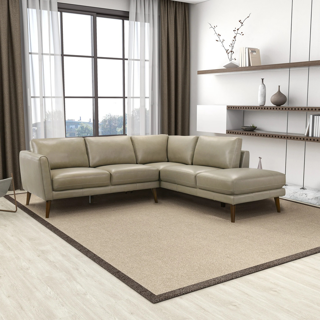 Benson Beige Leather Sectional Sofa Right Facing Chaise in Living Room.