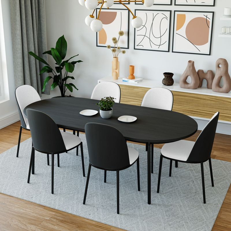 LeisureMod Tule Mid-Century Modern Dining Side Chair with Leather Seat and Powder-Coated Steel Frame Black/White at Table.