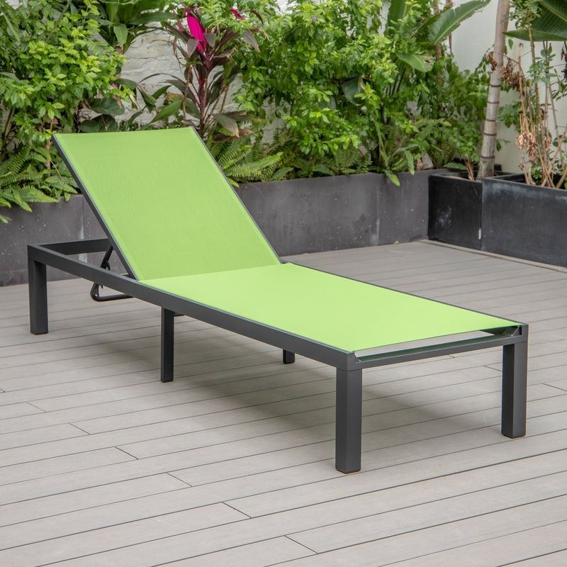 LeisureMod Marlin Patio Chaise Lounge Chair with Black Aluminum Frame Green on Deck.