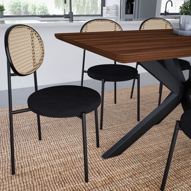 LeisureMod Euston Modern Wicker Dining Chair with Velvet Round Seat Black by Table.
