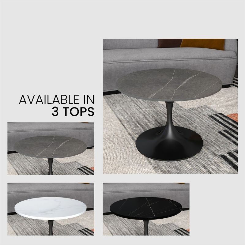 Round coffee table with marble top in various colors on a gray rug.