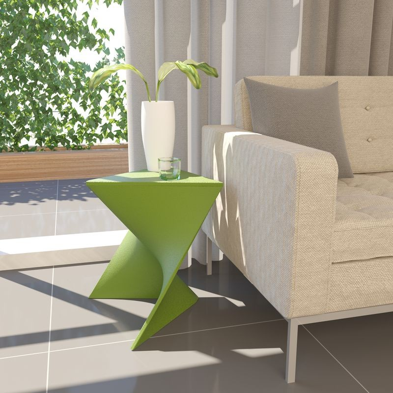 Green side table with a plant next to a beige sofa on a patio.