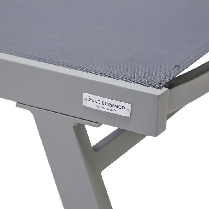 LeisureMod Marlin Patio Chaise Lounge Chair with Armrests in Grey Aluminum Frame, Set of 2 in Dark Grey Closeup.