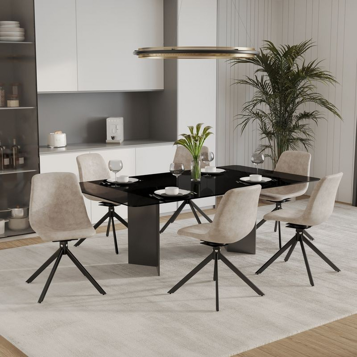 LeisureMod Markley Modern Leather Swivel Dining Chair with Metal Legs in Taupe at Table.