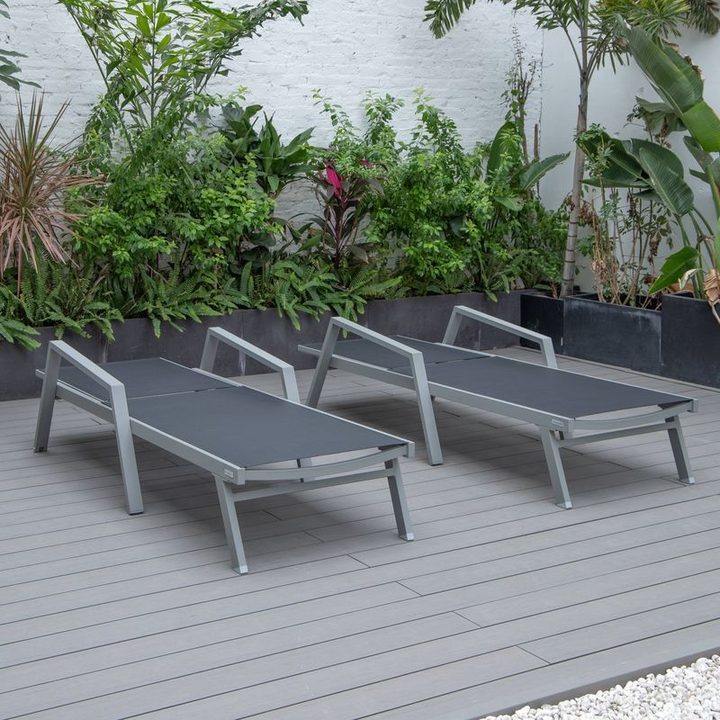 LeisureMod Marlin Patio Chaise Lounge Chair with Armrests in Grey Aluminum Frame, Set of 2 in Black Flat View.