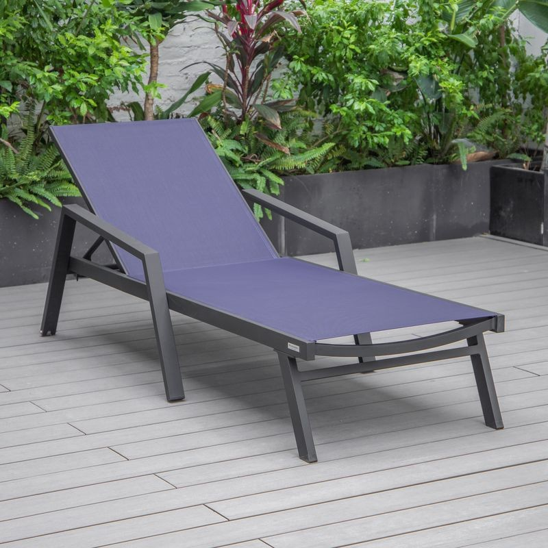 LeisureMod Marlin Patio Chaise Lounge Chair with Armrests in Black Aluminum Frame Navy Blue Photo.