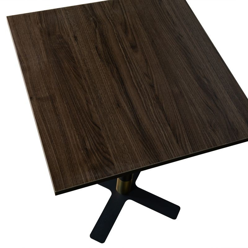 LeisureMod Vail Collection Dining Table Black/Gold X Base With 24" Square Dark Brown MDF Top Closeup.