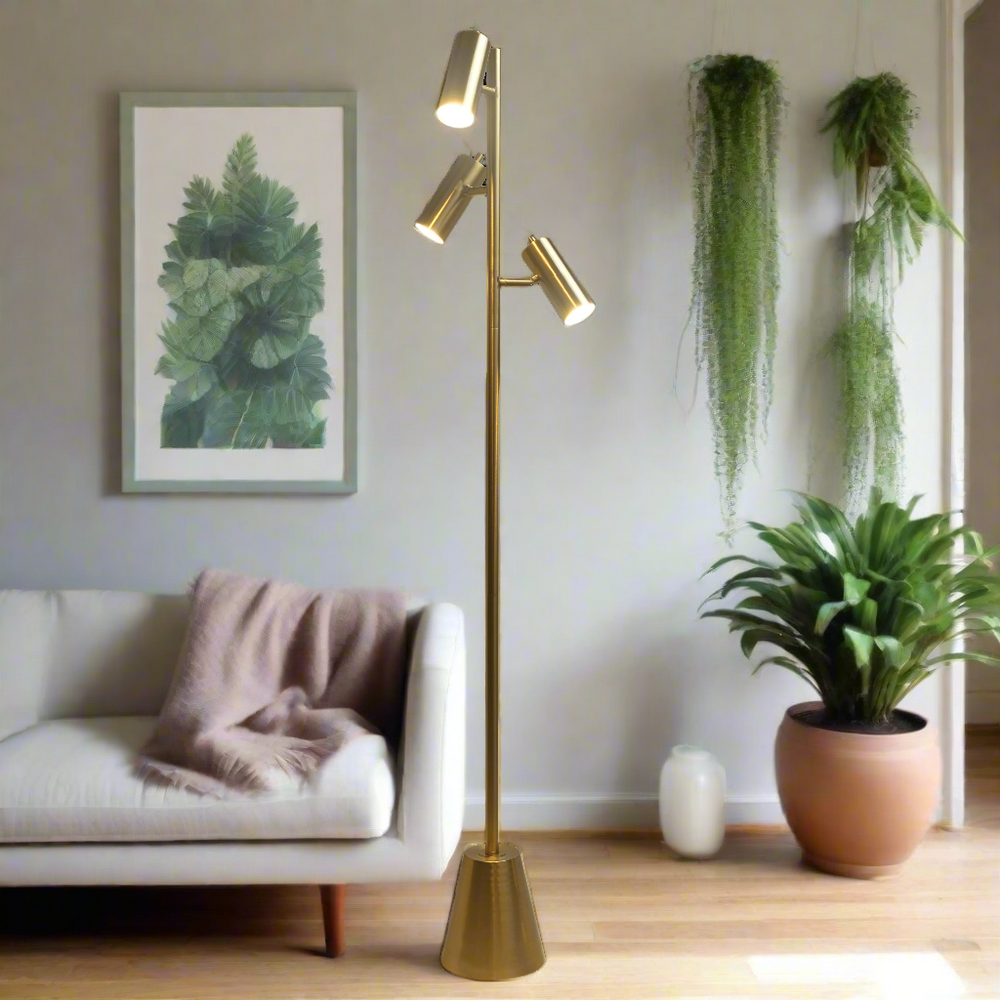 Lumina Brass Gold Floor Lamp with Rotary Switch Triple Spots Metal Cone Base with Background.