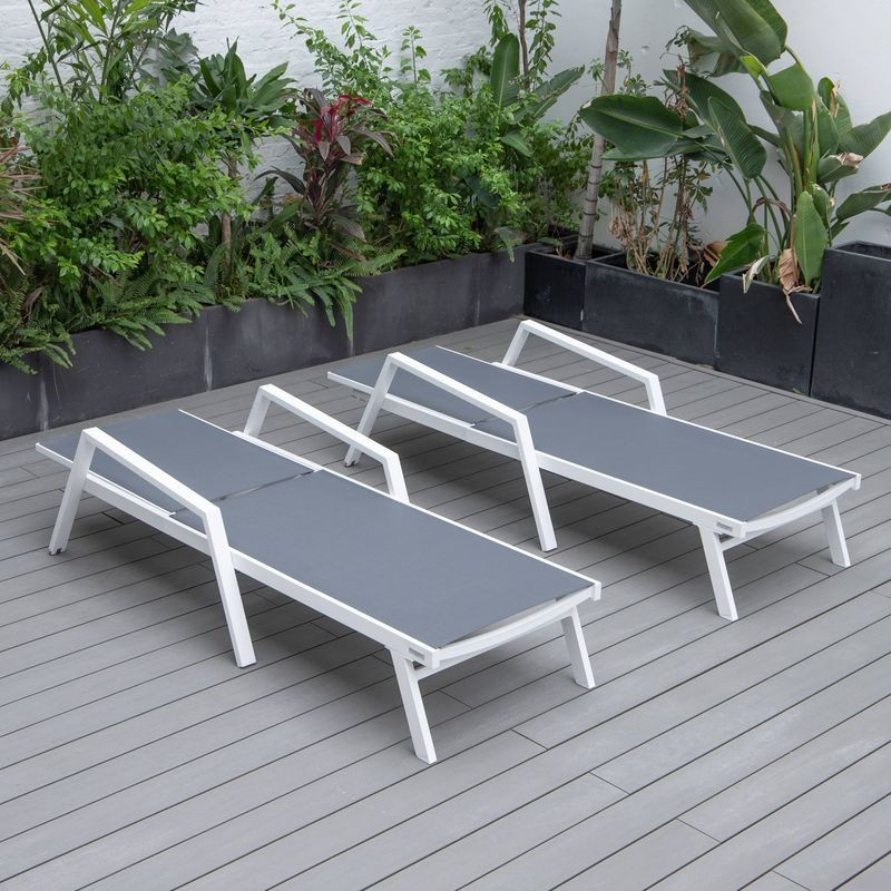LeisureMod Marlin Patio Chaise Lounge Chair with Armrests in White Aluminum Frame, Set of 2 in Dark Grey Flat View.