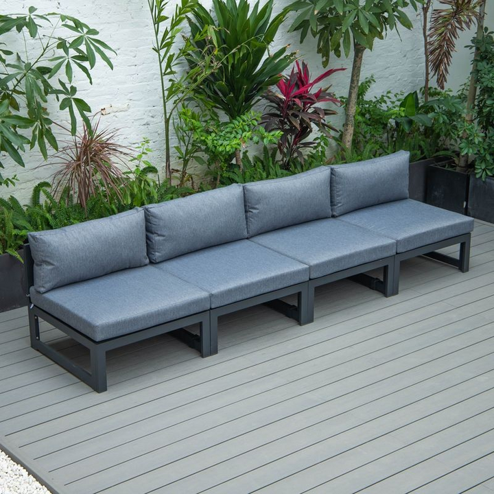 LeisureMod Chelsea 4-Piece Middle Patio Chairs Black Aluminum with Cushions Blue on Deck.