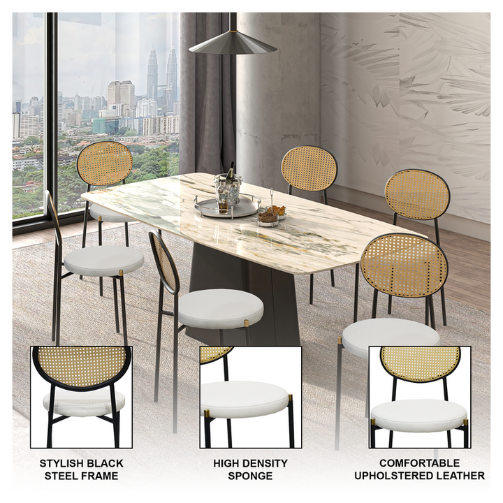 Dining room setup with a table and chairs in a modern interior setting.