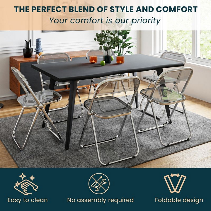 LeisureMod Lawrence Acrylic Folding Chair with Metal Frame Transparent Black at Table.