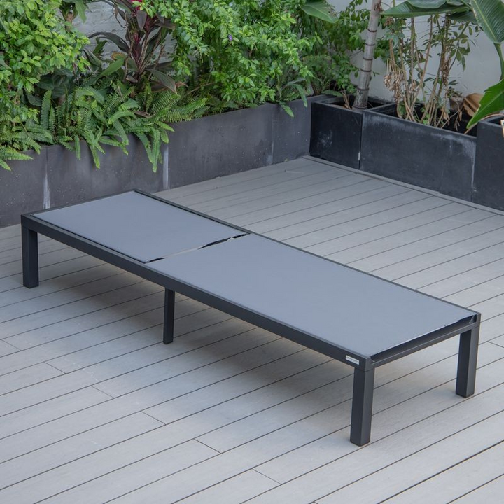 LeisureMod Marlin Patio Chaise Lounge Chair with Black Aluminum Frame Dark Grey Flat.